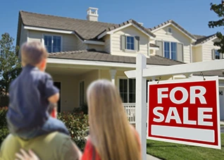 Family looks at house for sale. Selling a home can be emotional.